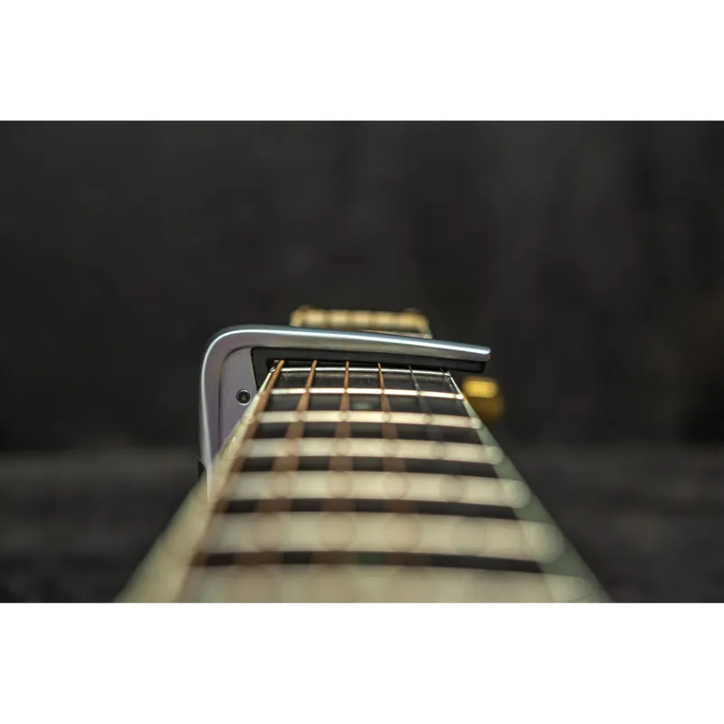 Dunlop 63CBK Trigger Fly Capo for akustisk gitar/elgitar, svart